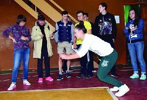 Значок ГТО на груди у него…