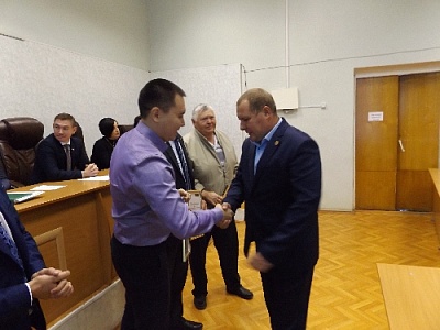 За вклад в развитие  сельского хозяйства